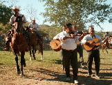 Mariachia parade at rodeo - day to learn Spanish
